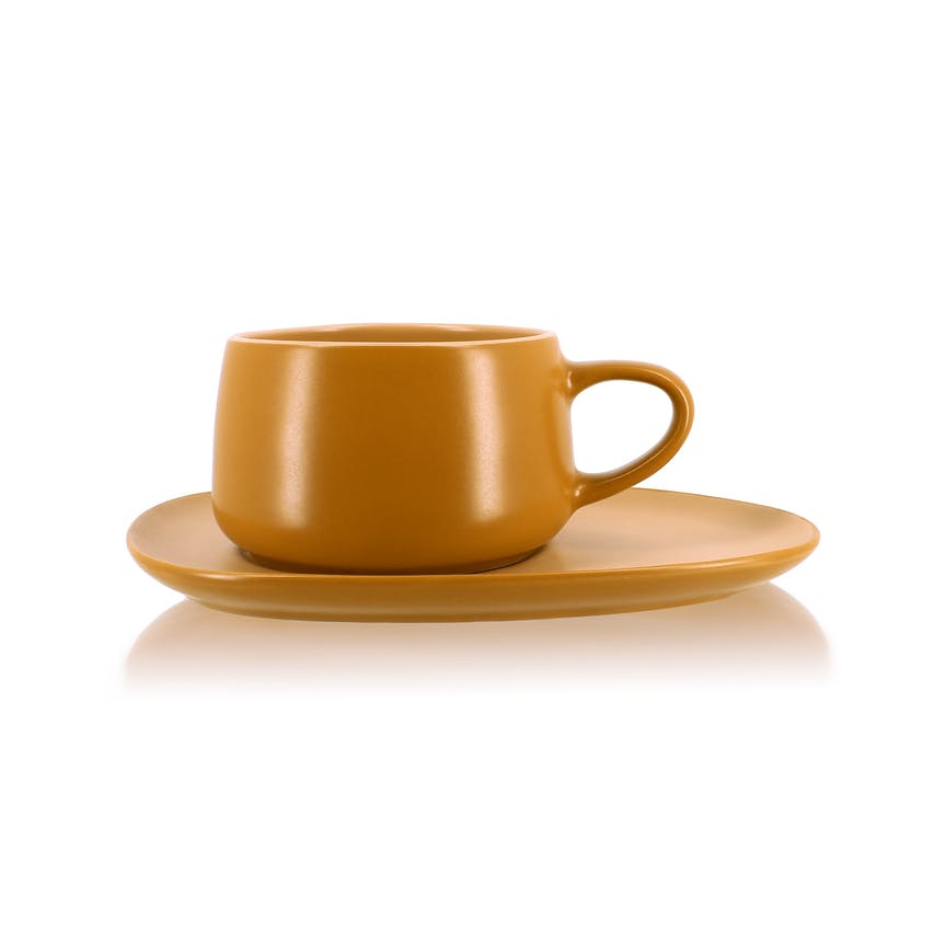 Set mit Tasse und Untertasse aus Steingut - gelb - von OGO